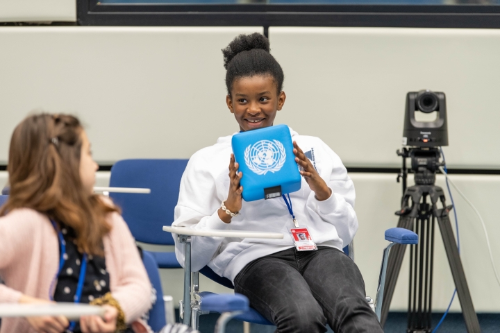 Girls testing audio and video equipment at UNIDO’s session